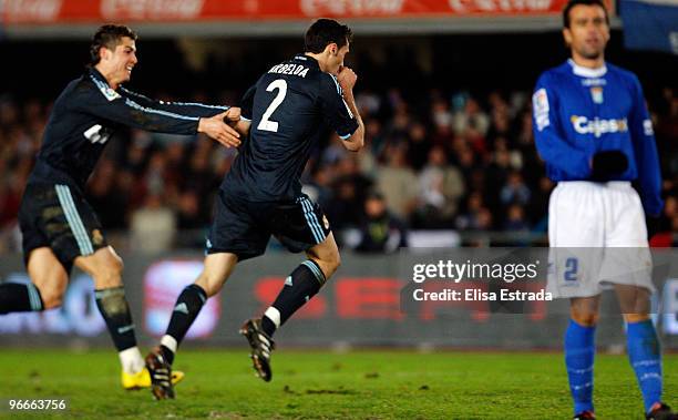 Alvaro Arbeloa of Real Madrid celebrates with Cristiano Ronaldo after scoring during the La Liga match between Xerez CD and Real Madrid at Estadio...