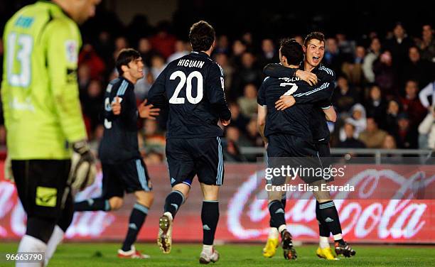 Alvaro Arbeloa of Real Madrid celebrates with Cristiano Ronaldo after scoring during the La Liga match between Xerez CD and Real Madrid at Estadio...