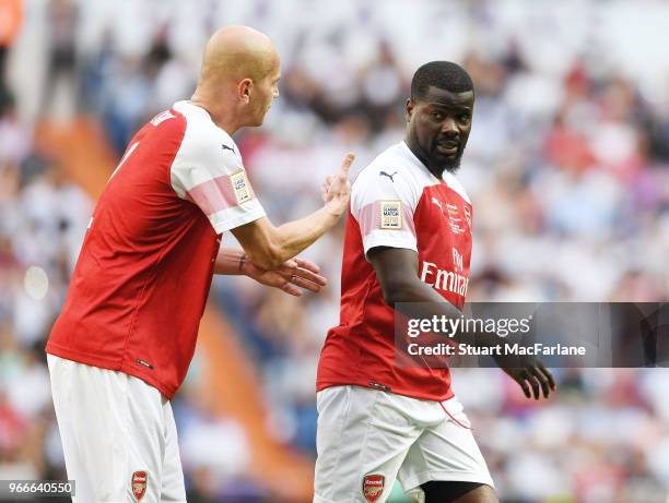 Pascal Cygan and Emmanuel Eboue of Arsenal during the match between Real Madrid CL Legends and Arsenal FC Legends at Estadio Santiago Bernabeu on...