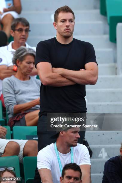 David Lee, fiance of Caroline Wozniacki of Denmark watches on as she faces Daria Kasatkina of Russia in the ladies singles fourth round match during...