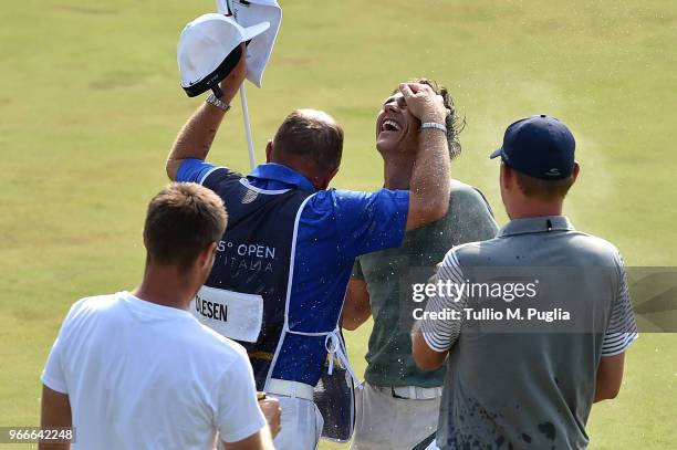 Thorbjorn Olesen of Denmark celebrates victory on the 18th green during the final round of the Italian Open at Gardagolf Country Club on June 3, 2018...