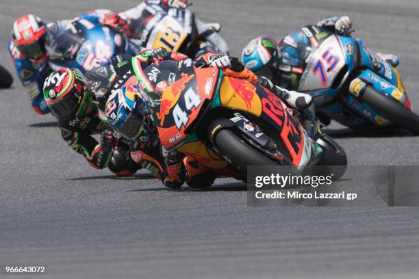 Miguel Oliveira of Portugal and Red Bull KTM Ajo leads the field during the Moto2 race during the MotoGp of Italy - Race at Mugello Circuit on June...