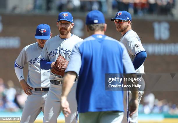 Toronto Blue Jays manager John Gibbons walks to the mound to replace Danny Barnes of the Toronto Blue Jays in the eighth inning of the game against...