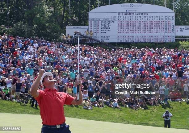 Bryson DeChambeau celebrates after winning in a playoff against Byeong-Hun An of South Korea during the final round of The Memorial Tournament...