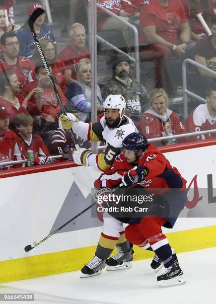 Jay Beagle of the Washington Capitals skates against Deryk Engelland of the Vegas Golden Knights in Game Three of the 2018 NHL Stanley Cup Final at...