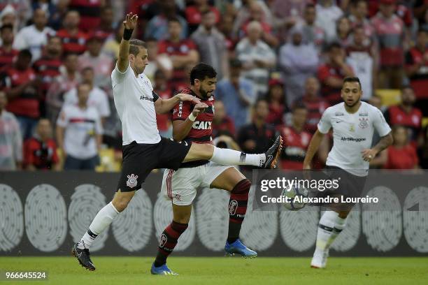 Henrique Dourado of Flamengo struggles for the ball with Henrique of Corinthians during the match between Flamengo and Corinthians as part of...