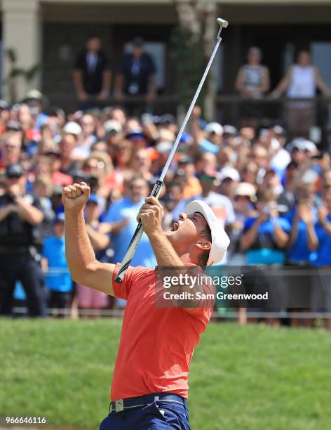 Bryson DeChambeau celebrates after winning in a playoff against Byeong-Hun An of South Korea during the final round of The Memorial Tournament...