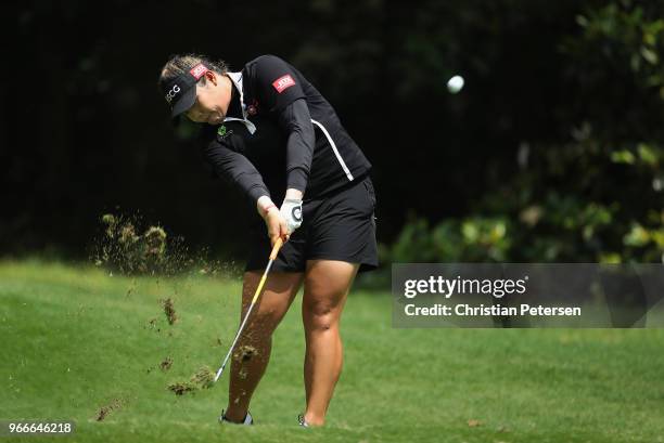 Ariya Jutanugarn of Thailand plays a tee shot on the eighth hole during the final round of the 2018 U.S. Women's Open at Shoal Creek on June 3, 2018...