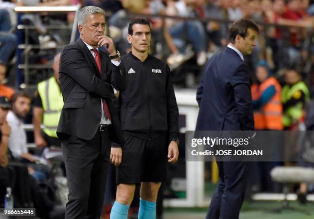 Switzerland's Bosnian-Herzegovinian coach Vladimir Petkovic and Spain's coach Julen Lopetegui stand on the sideline during the international friendly...