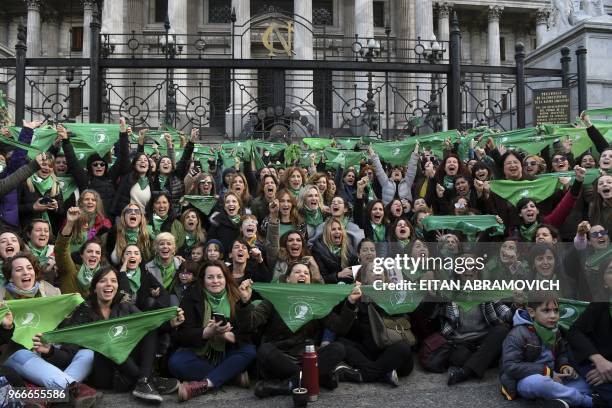 Argentine actresses, along with dozens of other pro-choice activists, gather in front of the Argentine Congress in Buenos Aires, on June 3 calling...