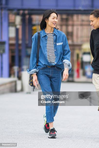 Liu Wen arrives for the Aleander Wang resort fashion show at Pier 17 on June 3, 2018 in New York City.