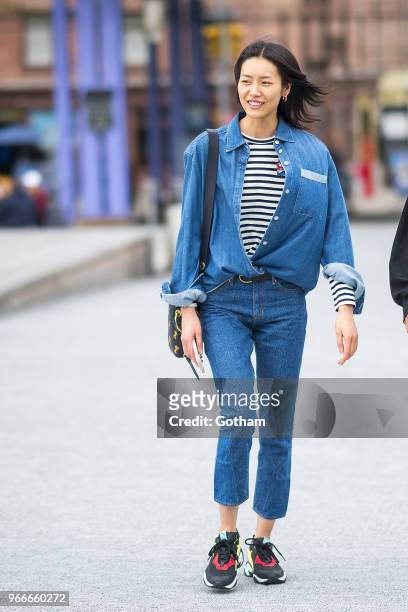 Liu Wen arrives for the Aleander Wang resort fashion show at Pier 17 on June 3, 2018 in New York City.