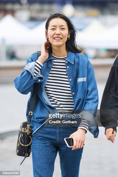 Liu Wen arrives for the Aleander Wang resort fashion show at Pier 17 on June 3, 2018 in New York City.
