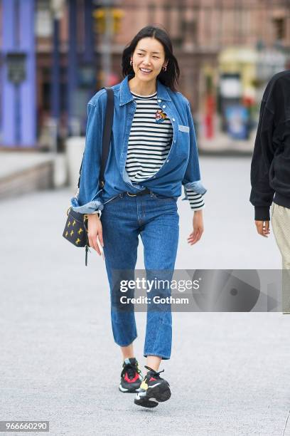 Liu Wen arrives for the Aleander Wang resort fashion show at Pier 17 on June 3, 2018 in New York City.