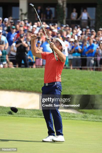 Bryson DeChambeau celebrates after winning in a playoff against Byeong-Hun An of South Korea during the final round of The Memorial Tournament...