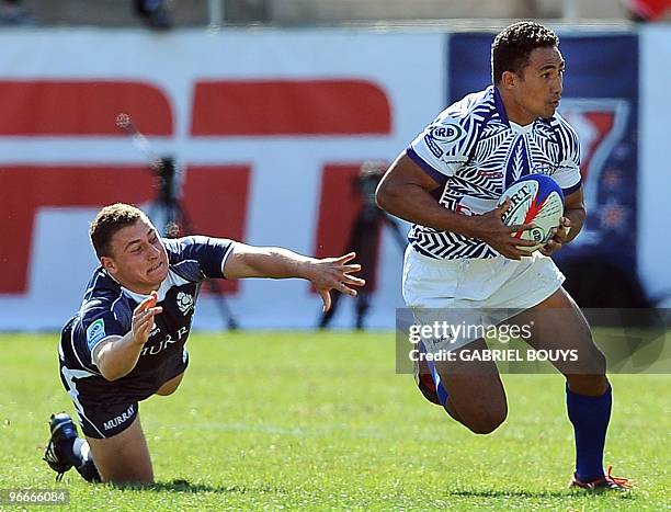 Uale Mai of Samoa outpasses Scott Riddell of Scotland during the 2010 USA Rugby Sevens tournament at the Sam Boyd Stadium in Las Vegas, Nevada on...