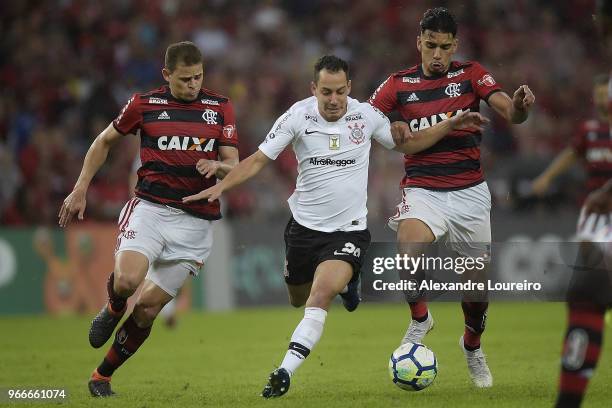 Lucas Paqueta and Rene of Flamengo struggles for the ball with Rodriguinho of Corinthians during the match between Flamengo and Corinthians as part...