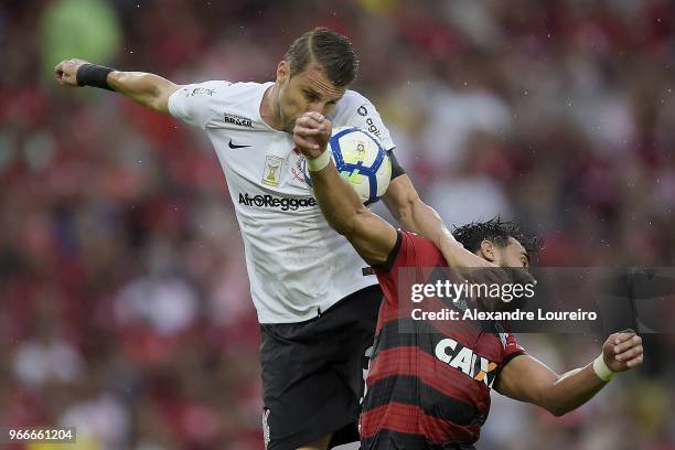 Henrique Dourado of Flamengo struggles for the ball with Henrique of Corinthians during the match between Flamengo and Corinthians as part of...