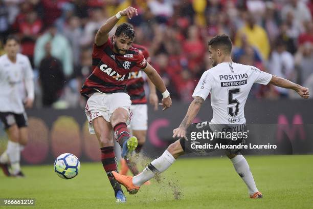 Henrique Dourado of Flamengo struggles for the ball with Gabriel of Corinthians during the match between Flamengo and Corinthians as part of...