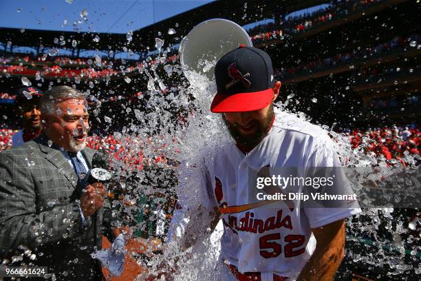 Michael Wacha of the St. Louis Cardinals is doused with ice after taking a no-hitter into the ninth inning against the Pittsburgh Pirates at Busch...