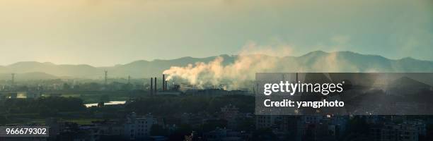 industrial smokestacks and cities - smog city stock pictures, royalty-free photos & images