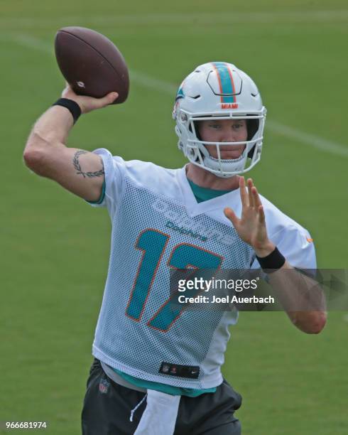 Ryan Tannehill of the Miami Dolphins throws the ball during the teams training camp on May 30, 2018 at the Miami Dolphins training facility in Davie,...