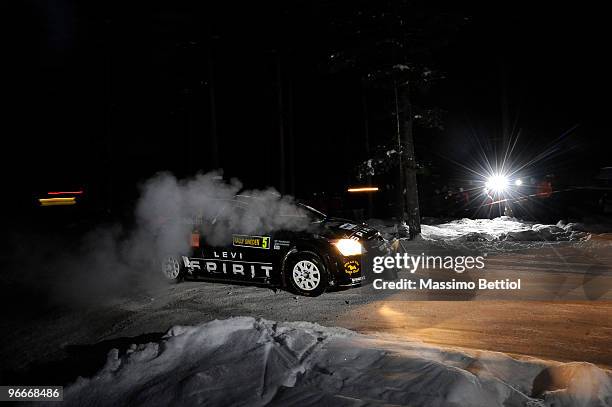 Marcus Gronholm of Finland and Timo Rautiainen of Finland compete in their Stobart Ford Focus during Leg 2 of the WRC Rally Sweden on February 13,...