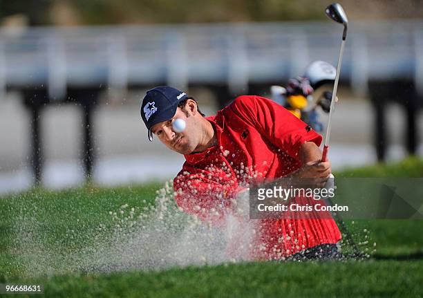 Dallas Cowboys quarterback Tony Romo hits from a bunker on during the third round of the AT&T Pebble Beach National Pro-Am at Pebble Beach Golf Links...