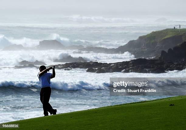 Alex Cejka of Germany plays his approach shot on the nineth hole during third round of the AT&T Pebble Beach National Pro-Am at Pebble Beach Golf...