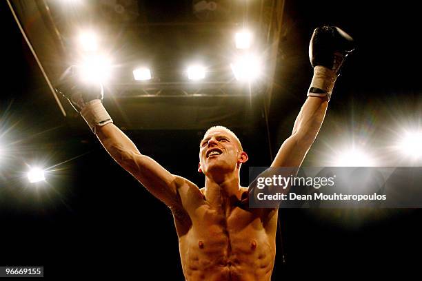 Michael Walsh of Cromer celebrates knock-out victory over Najid Ali of Cardiff after their Bantamweight bout at Wembley Arena on February 13, 2010 in...