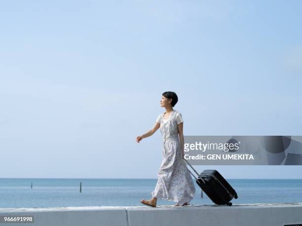 women traveling alone - gen i stock pictures, royalty-free photos & images
