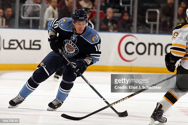 David Booth of the Florida Panthers skates with the puck against the Boston Bruins at the BankAtlantic Center on February 13, 2010 in Sunrise,...