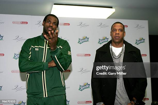 Superstar LeBron James and producer/rapper Shawn "Jay-Z" Carter speak to reporters before meeting with kids at the Dallas Boys & Girls Club on...