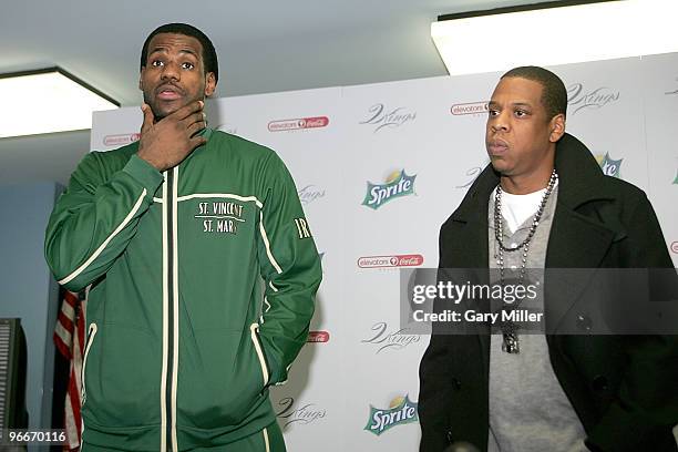 Superstar LeBron James and producer/rapper Shawn "Jay-Z" Carter speak to reporters before meeting with kids at the Dallas Boys & Girls Club on...