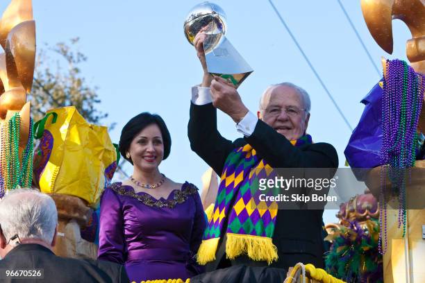 New Orleans Saints owner Tom Benson holding the Vince Lombardi Trophy for the New Orleans Saints Superbowl XLIV win and his wife Gayle ride in the...