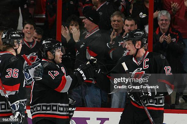 Ray Whitney of the Carolina Hurricanes celebrates his second period goal with teammate Eric Staal who provided and assist during a NHL game against...