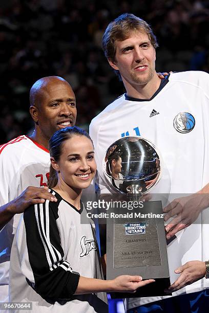 Analyst Kenny Smith formerly of the Houston Rockets, Becky Hammon and Dirk Nowitzki of the Dallas Mavericks, all of team Texas, hold the Champions...