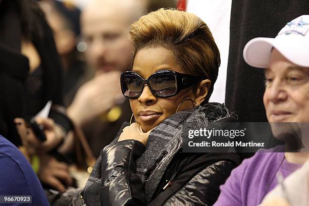 Recording artist Mary J. Blige looks on during the Haier Shooting Stars Competition on All-Star Saturday Night, part of 2010 NBA All-Star Weekend at...