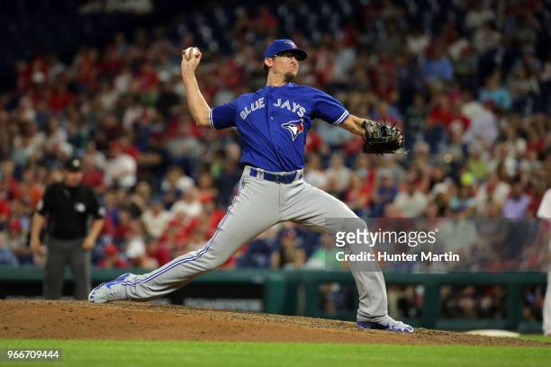Seung Hwan Oh of the Toronto Blue Jays throws a pitch during a game against the Philadelphia Phillies at Citizens Bank Park on May 25, 2018 in...