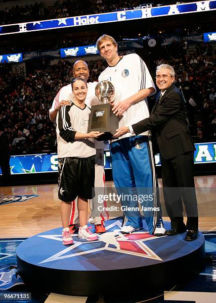 Dirk Nowitzki, Becky Hammon and Kenny Smith of Team Texas are presented with the championship trophy during the Haier Shooting Stars contest on...