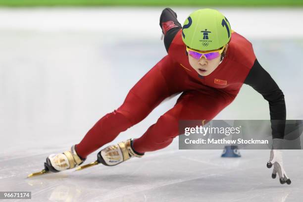 Wang Meng of China competes onm her way to breaking an Olympic record in the Ladies' 500 m Short Track on day 2 of the Vancouver 2010 Winter Olympics...