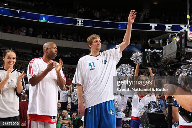 Dirk Nowitzki, Kenny Smith and Becky Hammon of Team Texas wave to the crowd as they are introduced during the Haier Shooting Stars contest on...