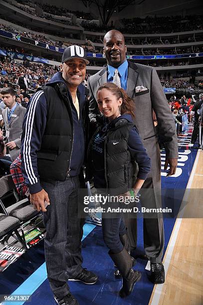 Legend Rick Fox, Actress Eliza Dushka, and Shaquille O'Neal of the Cleveland Cavaliers pose courtside prior to the Haier Shooting Stars Competition...