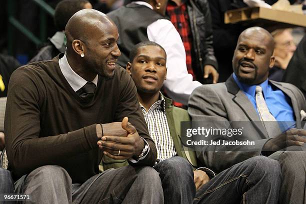 Kevin Garnett of the Boston Celtics, Kevin Durant of the Oklahoma City Thunder and Shaquille O'Neal of the Cleveland Cavaliers watch the Haier...