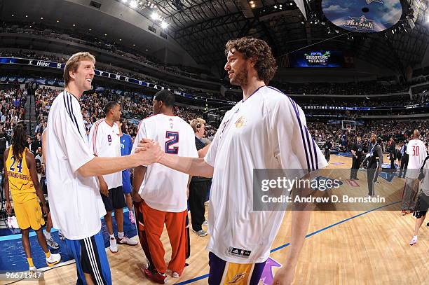 Dirk Nowitzki of Team Dallas is congratulated by Pau Gasol of Team Los Angeles of the during the 2010 Haier Shooting Stars on February 13, 2010 at...