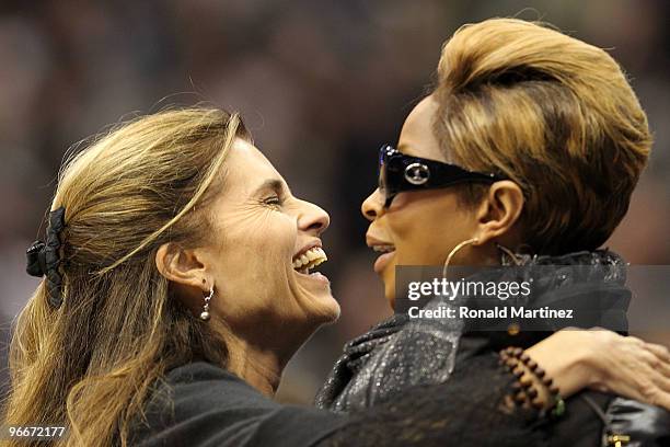 First Lady of California Maria Shriver and recording artist Mary J. Blige share a laugh during the Haier Shooting Stars Competition on All-Star...