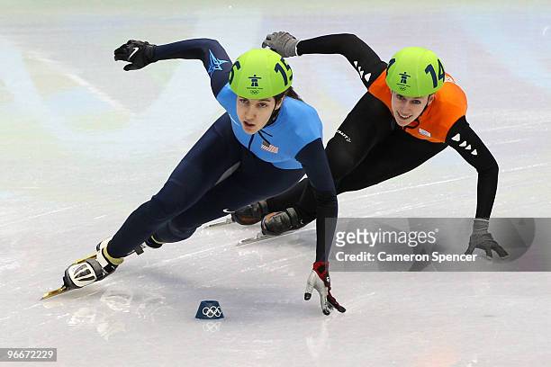 Lana Gehring of United States and Annita Van Doorn of Netherlands compete in the Ladies' 3000 m Relay Semifinal Short Track on day 2 of the Vancouver...