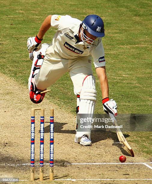 Damien Wright of the Bushrangers is run out by a direct hit from Dominic Thornley of the Blues during day three of the Sheffield Shield match between...