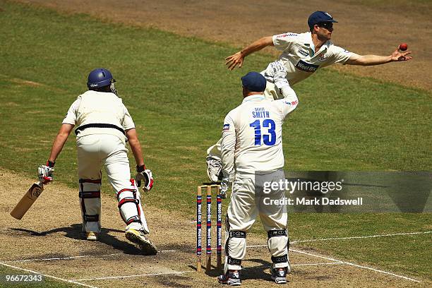 Jon Holland of the Bushrangers pads a ball away to Simon Katich of the Blues during day three of the Sheffield Shield match between the Victorian...