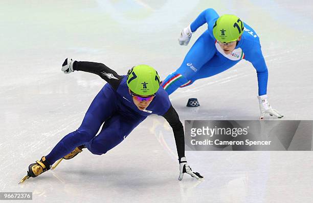 Ha-Ri Cho of South Korea and Arianna Fontana compete of Italy compete in the Ladies' 3000 m Relay Semifinal Short Track on day 2 of the Vancouver...